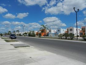 Merida, México street with homes suburban area – Best Places In The World To Retire – International Living